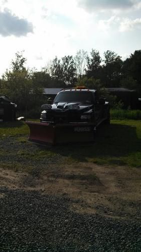 Dark blue body, black fiber glass ram air hood with 2010 boss v plow included