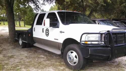 White, leather interior, 6.0 power stroke diesel, 4wd, c&amp;m flatbed,