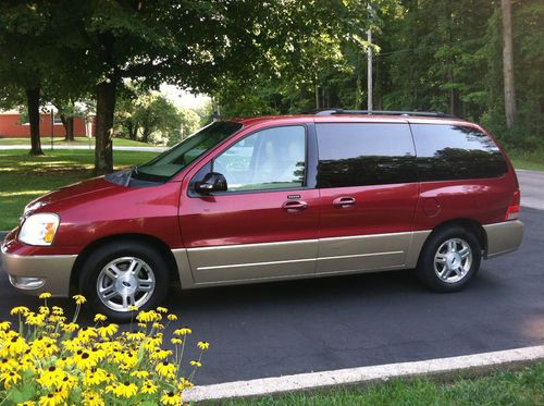 Loaded - ford freestar sel -very good condition,leather, smoke/pet free,clean