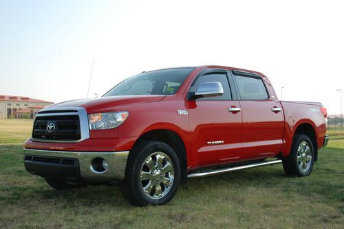 Bright red toyotatundra crew max trd 4x4 off road super clean truck,