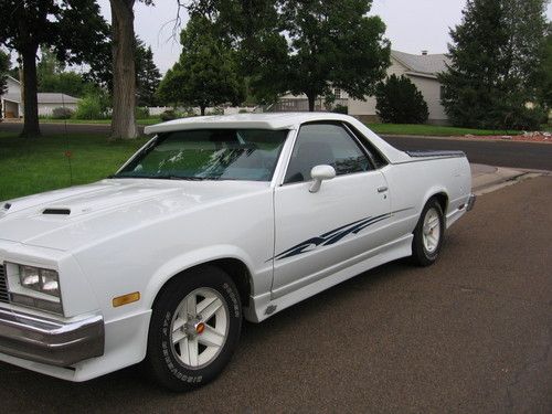 Beautifully customized white with blue pipeing chev, elcamino