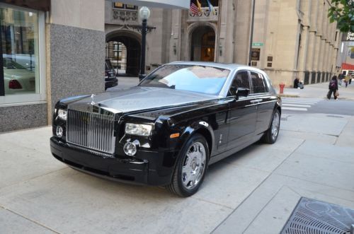 2008 rolls royce phantom.  black / silver contrast with black.