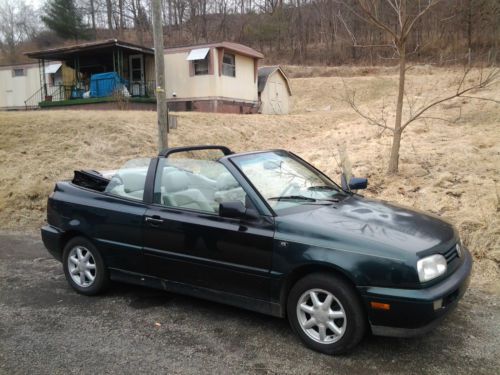 1996 vw cabrio convertable, manual, new soft top, great gas mileage and fun
