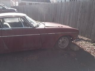 1968 p1800s volvo automobile plus numerous extra parrts