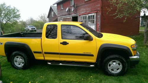 4x4, excellent condition, yellow, extended cab, 4 door, running boards, z71