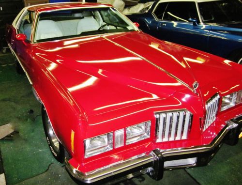1977 grand prix red beauty with classic white bucket seats new custom red paint