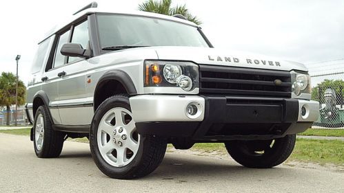 2004 land rover discovery se7 , dual roof , cd, 3 row , no reserve , florida