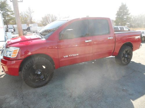 2006 nissan titan loaded jvc navigation system 10" kicker subs 20" rockstar xd