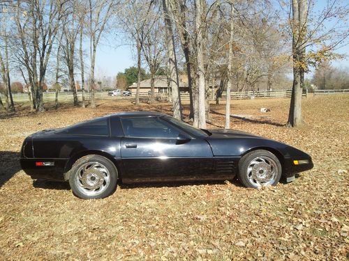 1994 corvette black on black 6 speed manual,13600k miles