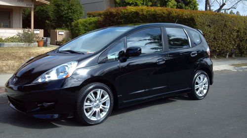 2009 honda fit sport.  41700 mi, brand new dunlop tires.  original owner.