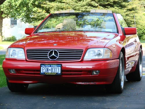 Bright red mercedes sl 500 convertable