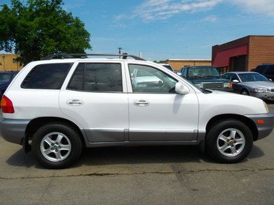 Super clean santa fe, leather, good tires, ice cold air, odor free, priced right