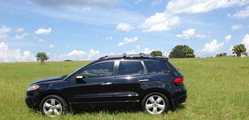 4-cylinder turbo, all wheel drive, black on black, clean vin