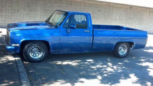 Chevy c10,classic chevy,lowered truck,roll pan,cowl hood,blue,truck,pick up,