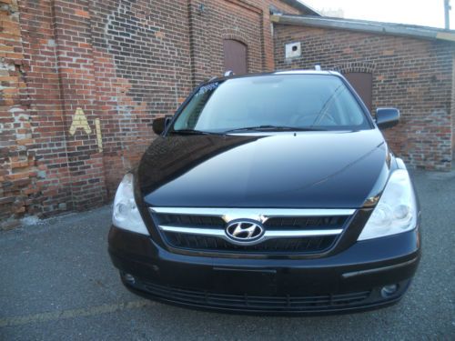 2007 hyundai entourage se third row seating, auto start, rear heat and a/c!