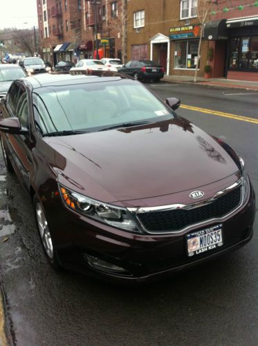 2011 kia optima ex  4-door 16900 miles used still under warranty fully loaded