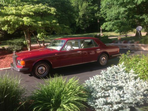 1987 rolls royce, silver spur, merlot in color with beautiful light tan interior