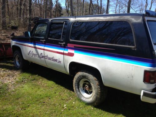 1982 suburban 4x4. with western power angle plow!