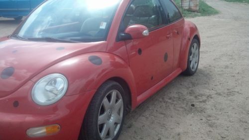 Orange turbo charged vehicle 2003 sunroof  leather