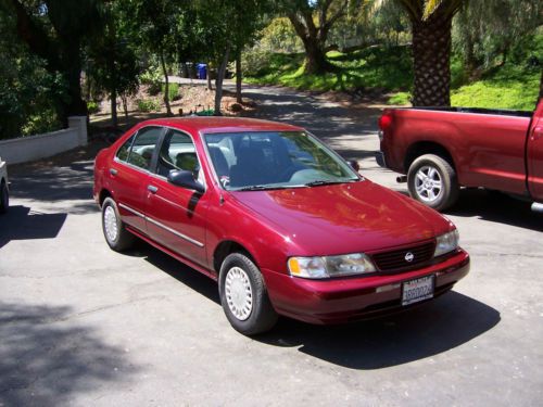 Excellent condition, maroon, nissan sentra, 4 door