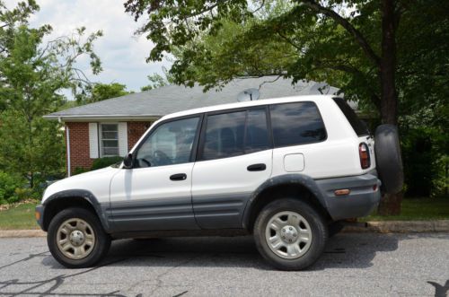 1999 toyota rav4, white with gray interior, needs new transmisson, great engine