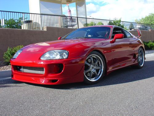 1993.5 red toyota supra single turbo 6spd