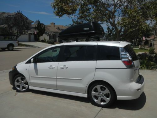 2006 mazda 5 touring. pearl white. 62,000 miles. one owner. cargo carrier.