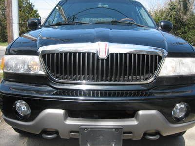 2000 lincoln navigator. no res. 3rd row. new tires. nice truck. bid on this baby