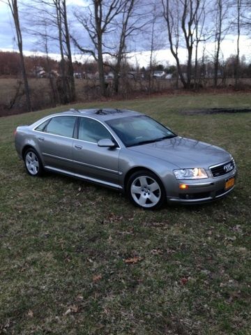 Dark silver with black interior. previous salvage history