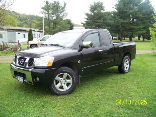 2004 nissat titan king cab 4x4 ..black beauty