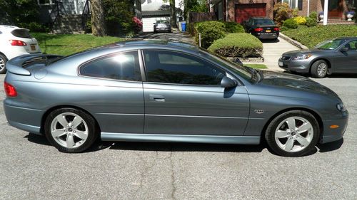 2005 gto coupe, under 2000 miles! 6-speed manual. cyclone gray/blk leather