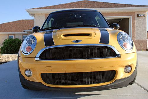 Mellow yellow with black mirror caps and roof