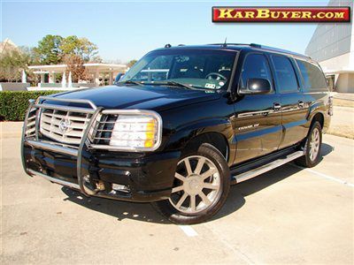 Esv,captain chairs,3rd row seats,wood trim,dvd video system,runs great!