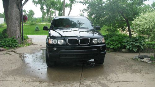 Arizona car bmw x 5 black n tan all wheel drive....