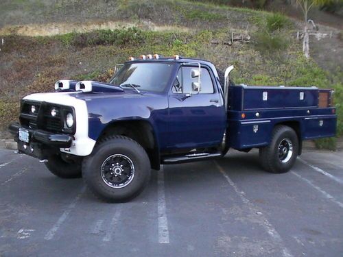 Custom 1979 dodge power wagon (orig. 300d), with cruise missle intakes on hood.