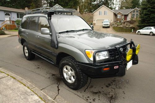 Safari rig: arb, slee, old man emu, snorkel, winch, outback drawers, rocksliders