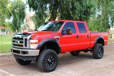 Gorgeous lifted low miles power stroke diesel 4x4 new tires xd wheels