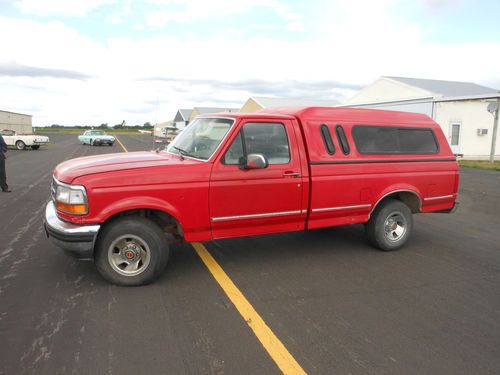 1992 ford f-150 truck pick up, fiberglass topper,and re built motor,  2wd