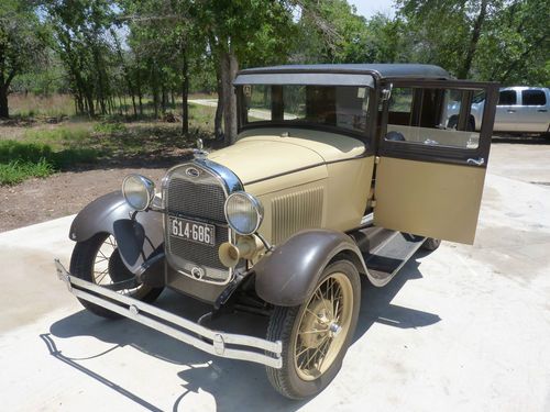 1928 model a ford fourdoor leatherback.
