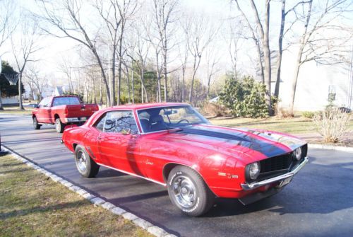 1969 camaro z28 black stripes on toronado red