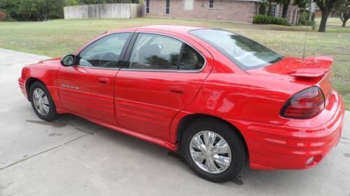 2002 pontiac grand am se red 2.2 liter ecotec sedan nice!