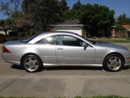 2002 mbz cl55 amg coupe. silver w/silver interior. 36,400 mi. ex. cond.