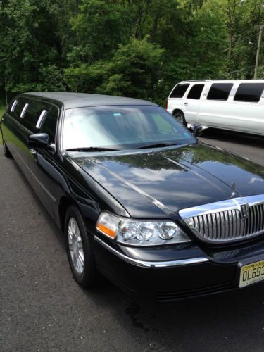 Limo limousine lincoln town car ford black stretched low reserve dabryan