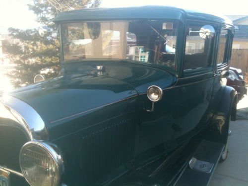 Rebuilt 1929 fordor model a, dark green, rebuilt engine, restored interior