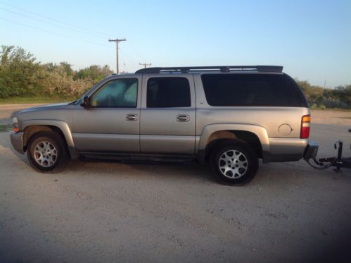 2003 4 wd chevrolet suburban, z71 tow pkg, bucket leather, bose xm, on*, dual ac