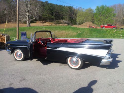 57 chevy bel air 4 door now a 2 door convertible, look !