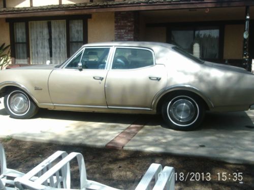 1969 oldsmobile cutlass 4 door town sedan