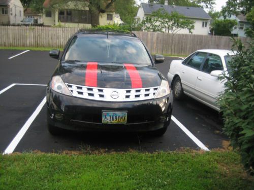 Nissan murano sl -black inside and outside with two red  stripes color