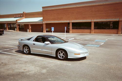 1995 pontiac trans am, silver 6 spd, 350, runs well,