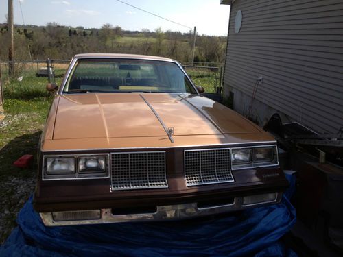 1985 oldsmobile cutlass supreme base coupe 2-door 5.0l